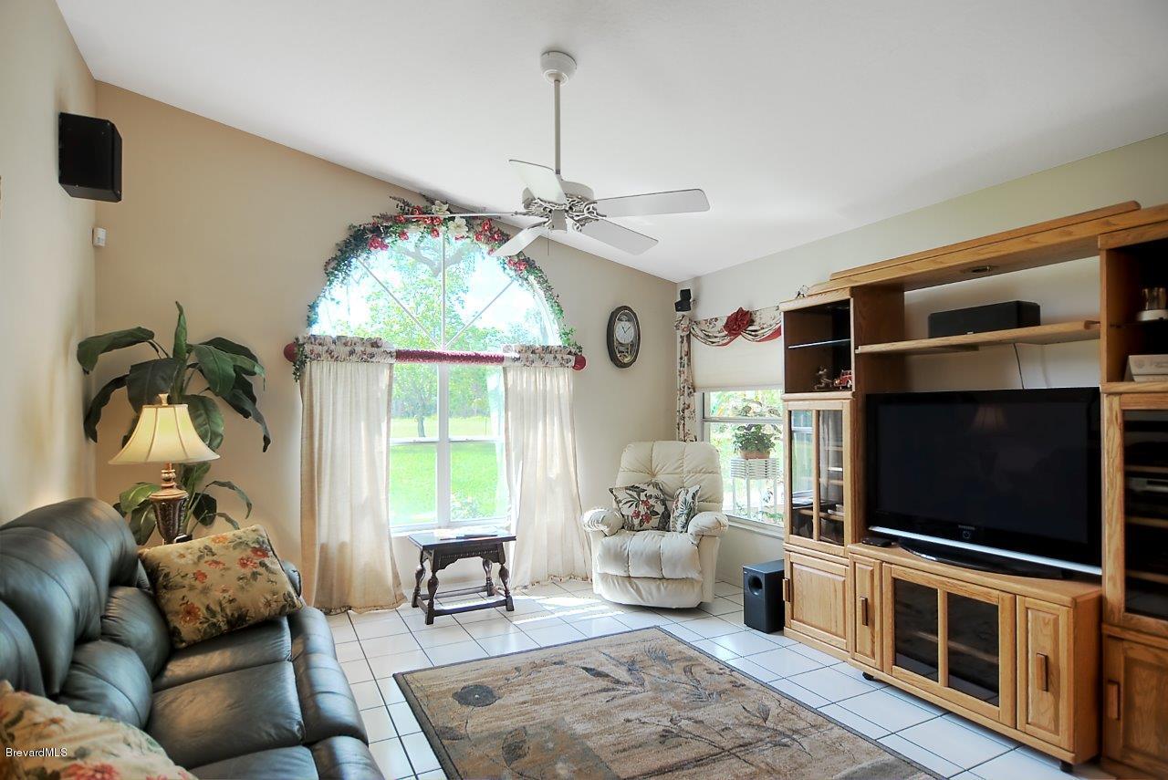 1180 Meadowbrook Road Northeast Palm Bay, FL 32905 - Photo 4 of 14 family (3).jpg