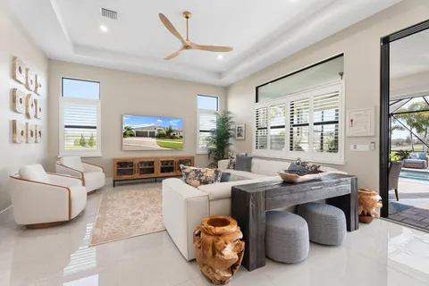 a living room with furniture and window