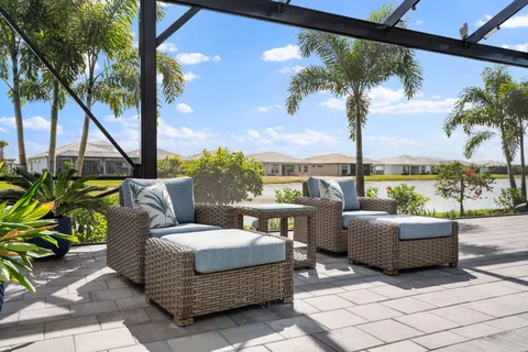 a view of a swimming pool with a patio