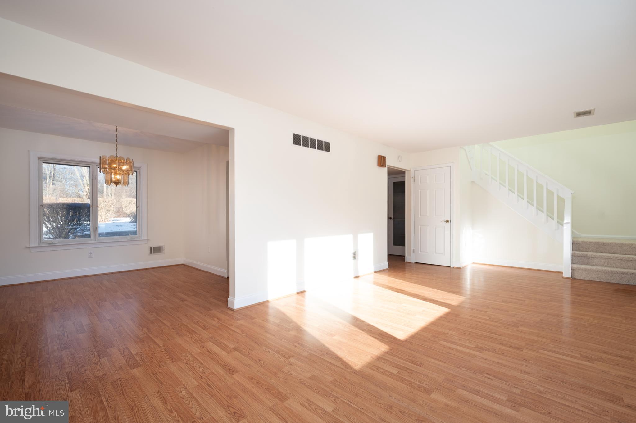 128 Birch Knoll Road Wilmington, DE 19810 - Photo 11 of 51 a view of a big room with wooden floor and windows