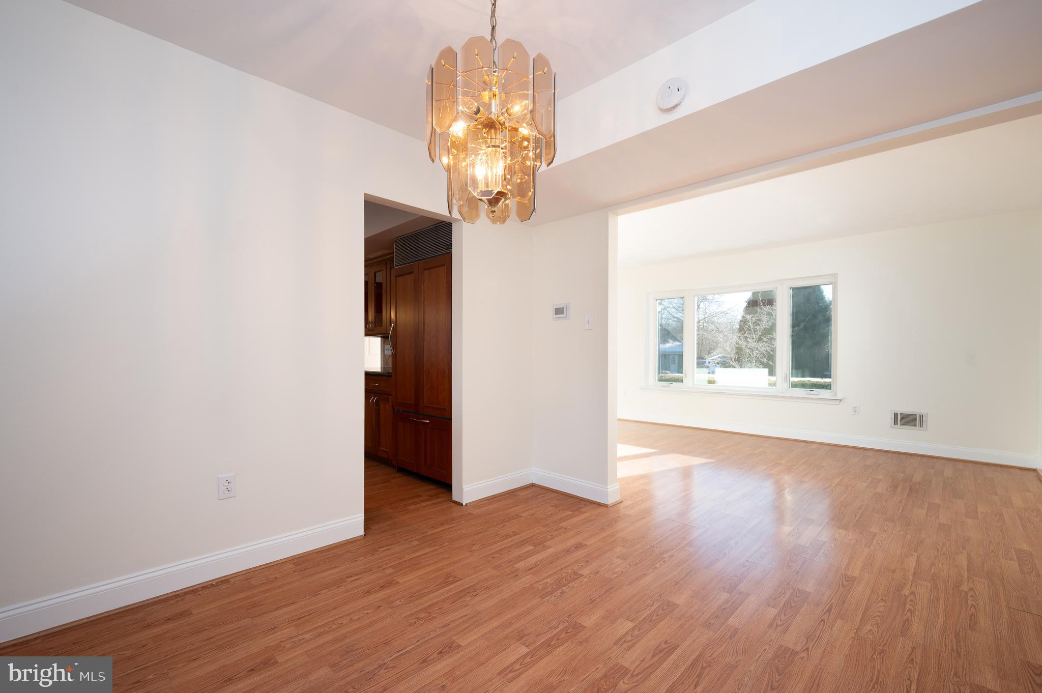 128 Birch Knoll Road Wilmington, DE 19810 - Photo 12 of 51 wooden floor in an empty room with a window