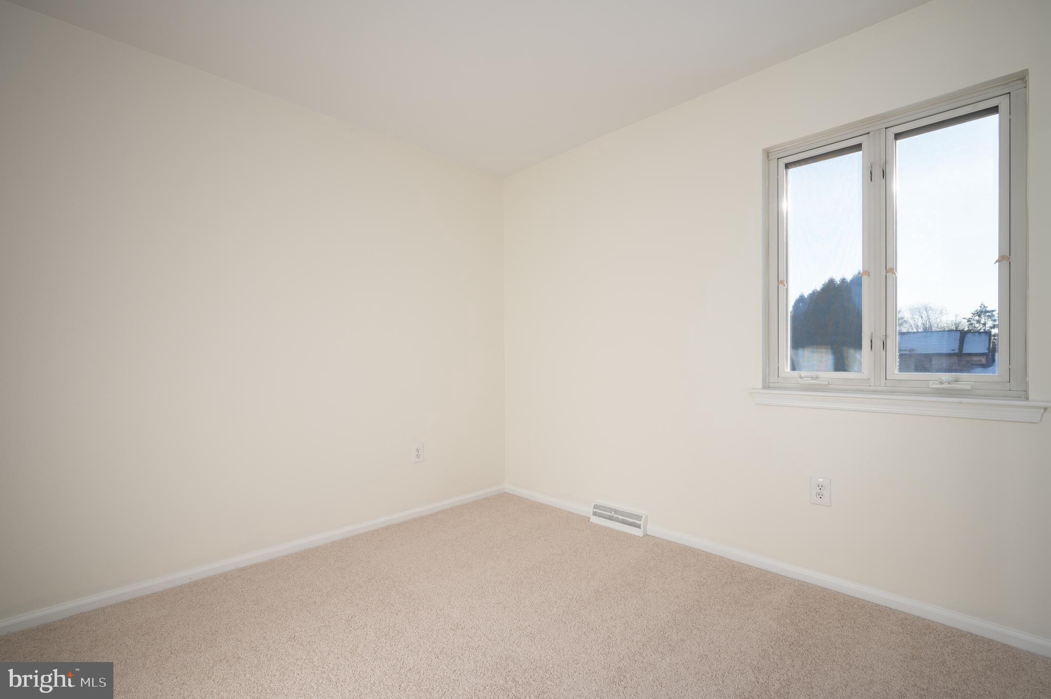 128 Birch Knoll Road Wilmington, DE 19810 - Photo 27 of 51 a view of an empty room and window