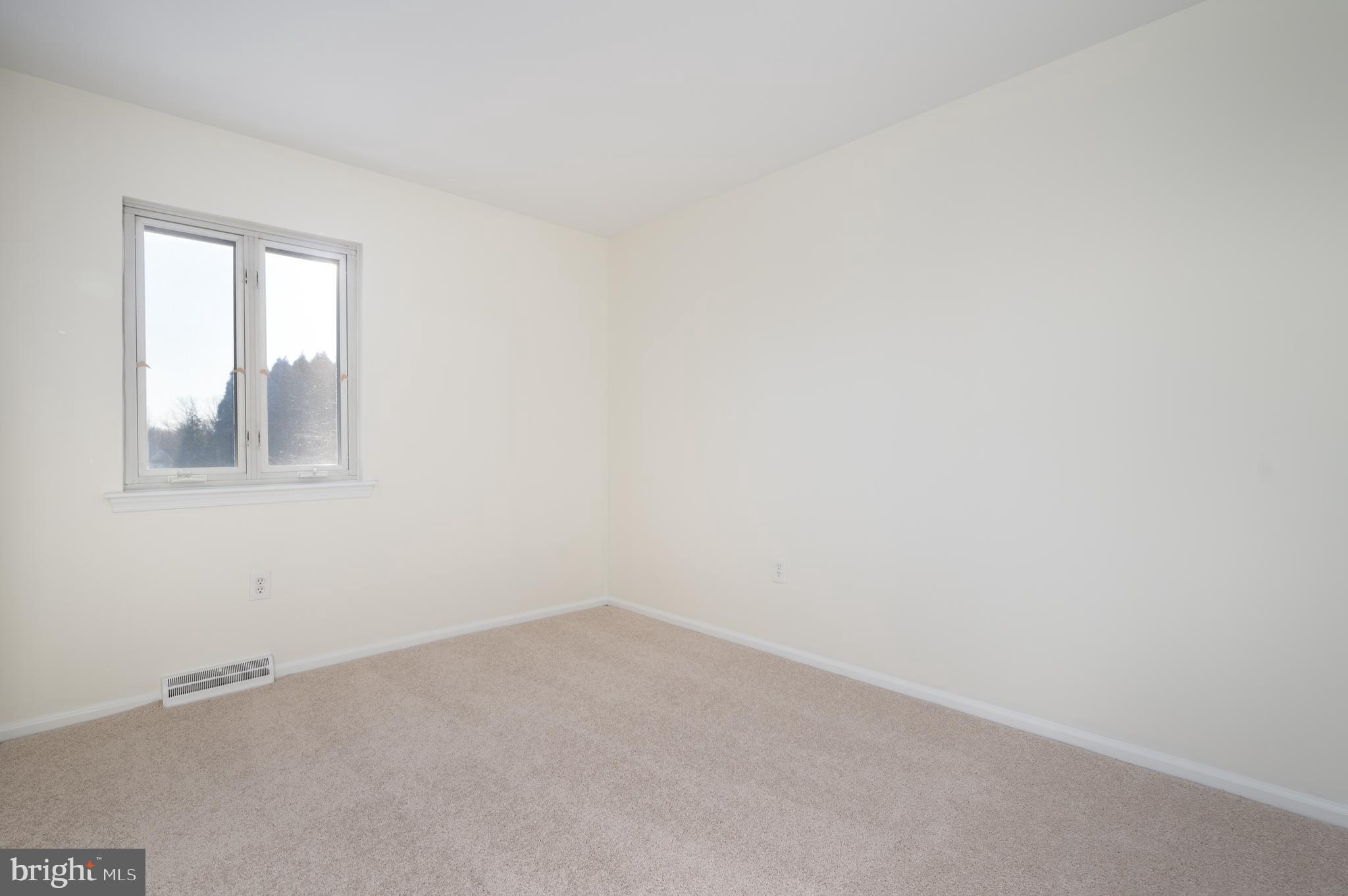 128 Birch Knoll Road Wilmington, DE 19810 - Photo 29 of 51 a view of an empty room with a window