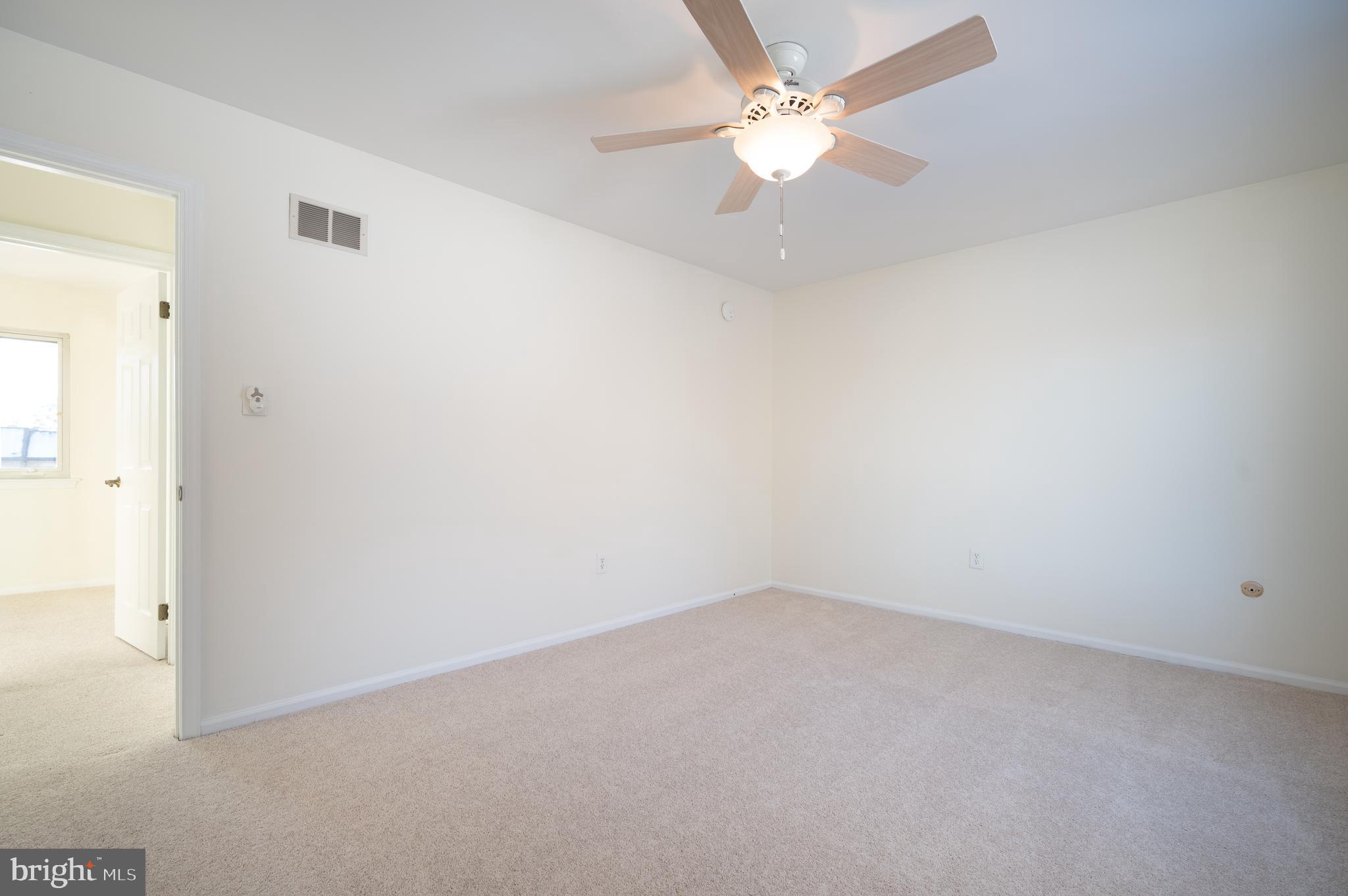 128 Birch Knoll Road Wilmington, DE 19810 - Photo 31 of 51 an empty room with a fan & a window