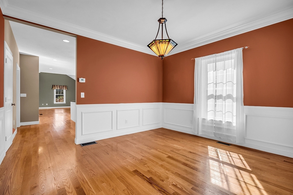 17 Runaway Brook Road Lancaster, MA 01523 - Photo 13 of 42 a view of empty room with wooden floor and window