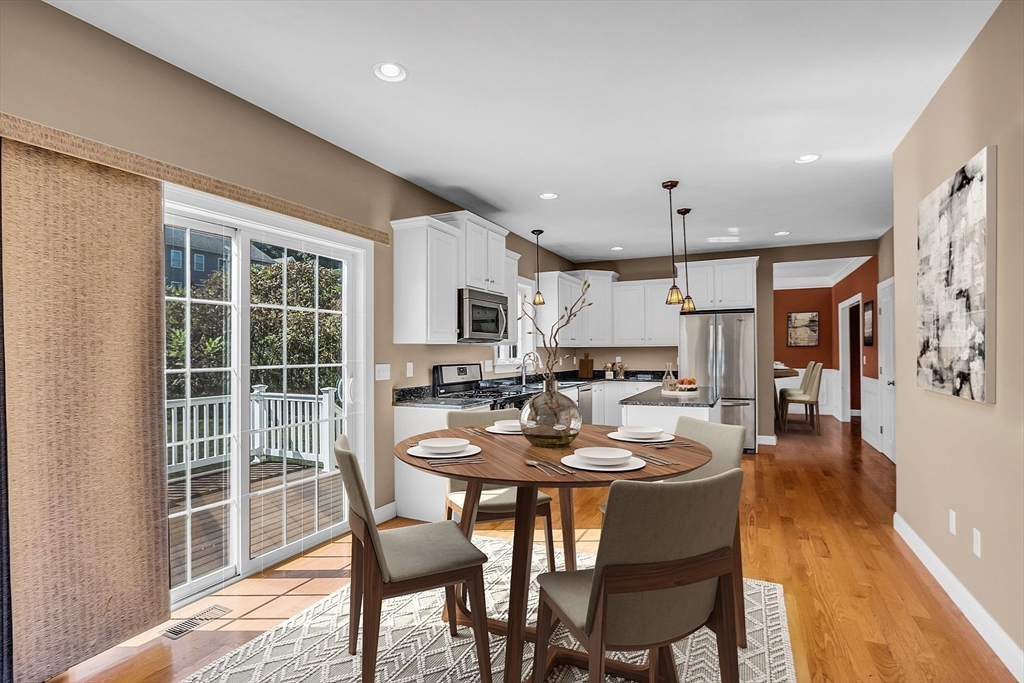 17 Runaway Brook Road Lancaster, MA 01523 - Photo 15 of 42 a dining room with furniture window and wooden floor