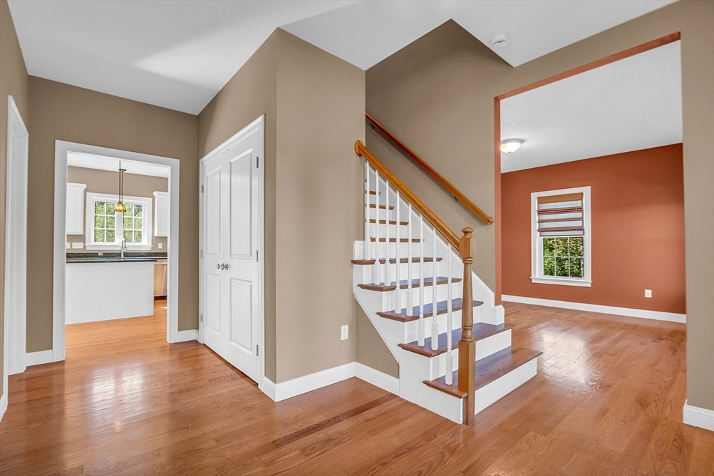 17 Runaway Brook Road Lancaster, MA 01523 - Photo 26 of 42 a view of entryway with wooden floor and stairs