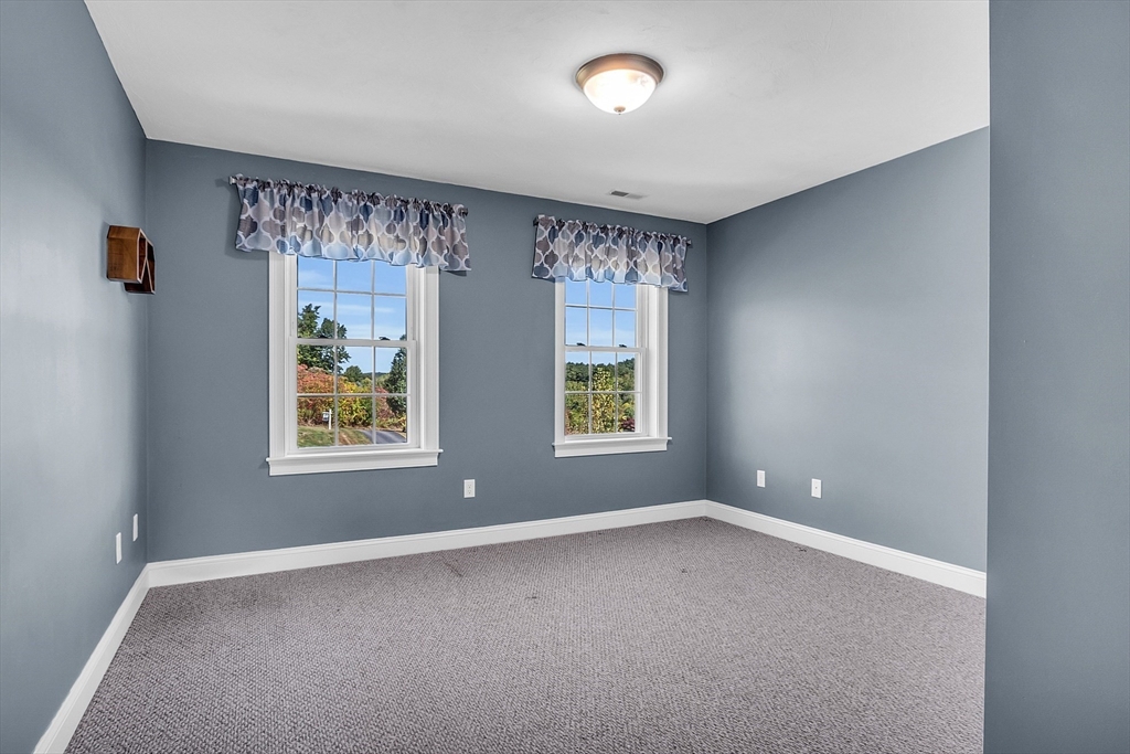 17 Runaway Brook Road Lancaster, MA 01523 - Photo 29 of 42 an empty room with windows