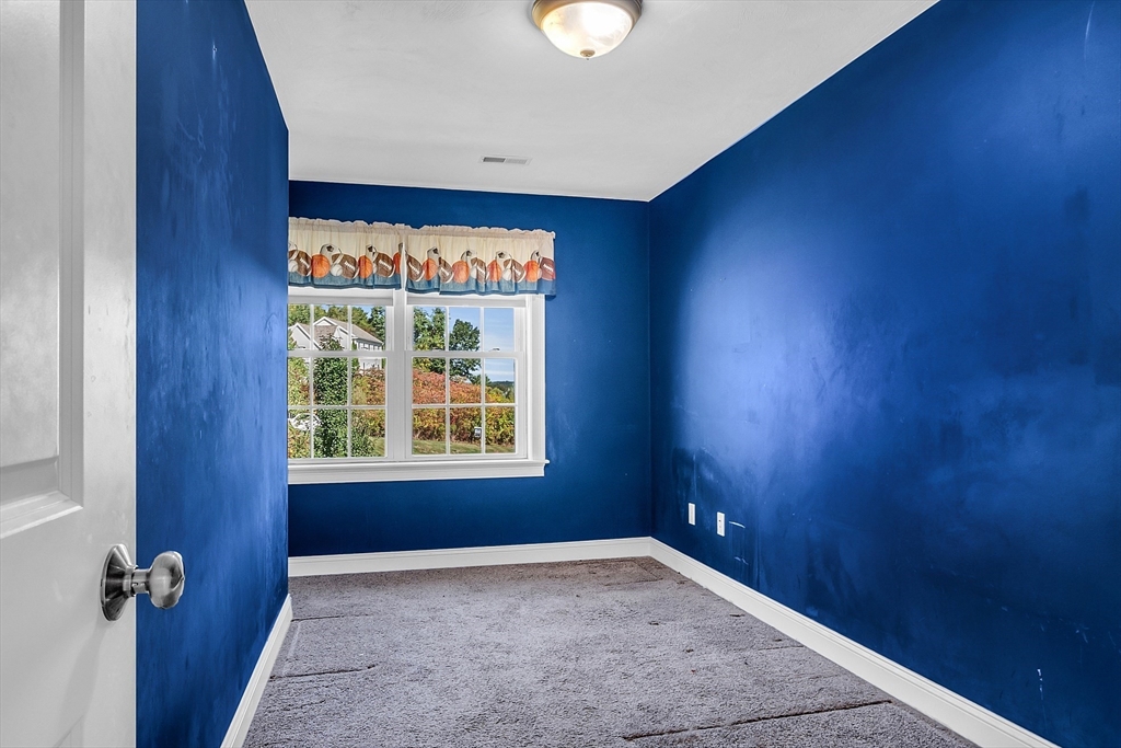 17 Runaway Brook Road Lancaster, MA 01523 - Photo 32 of 42 an empty room with windows