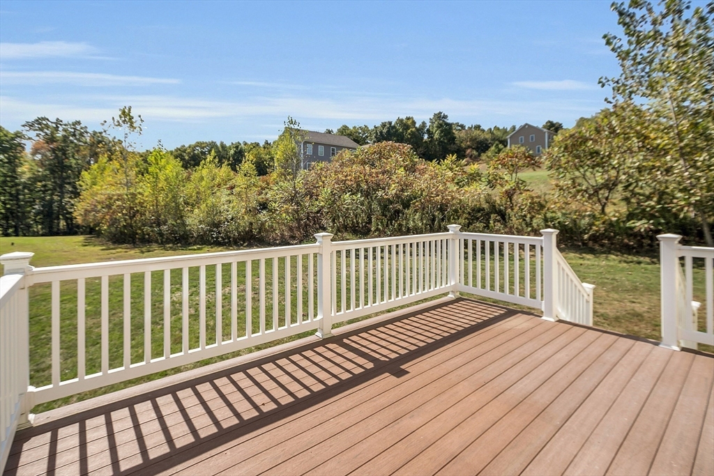 17 Runaway Brook Road Lancaster, MA 01523 - Photo 33 of 42 a view of a balcony with wooden floor