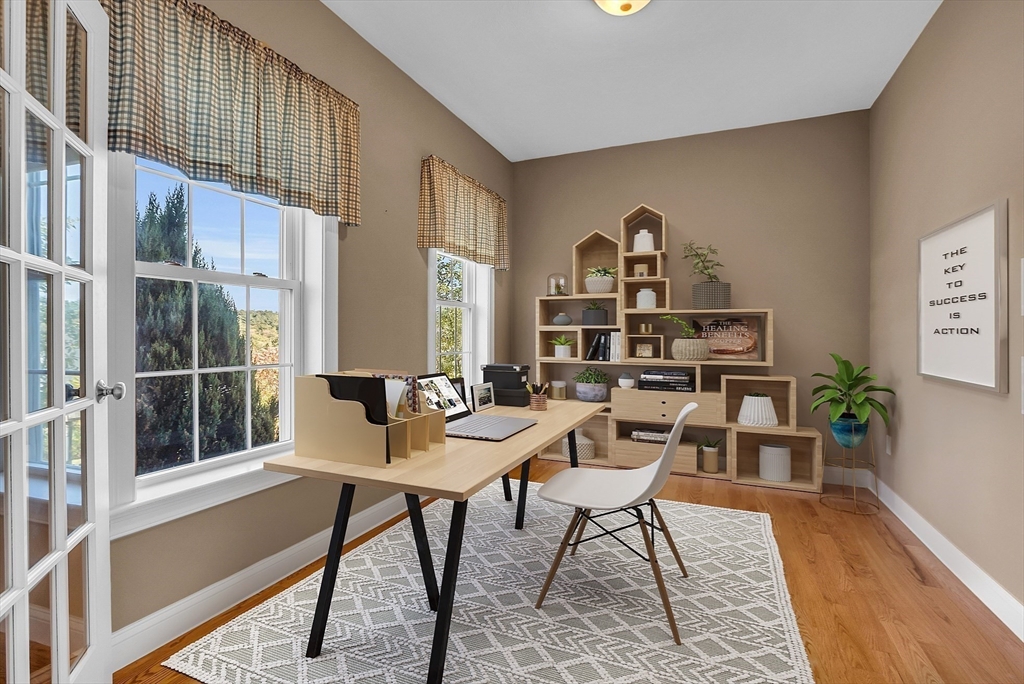 17 Runaway Brook Road Lancaster, MA 01523 - Photo 6 of 42 a view of a workspace with furniture window and wooden floor