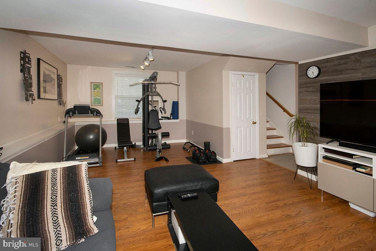 60 Vance Avenue Sicklerville, NJ 08081 - Photo 28 of 42 Lower Level Den : Wood Laminate Flooring