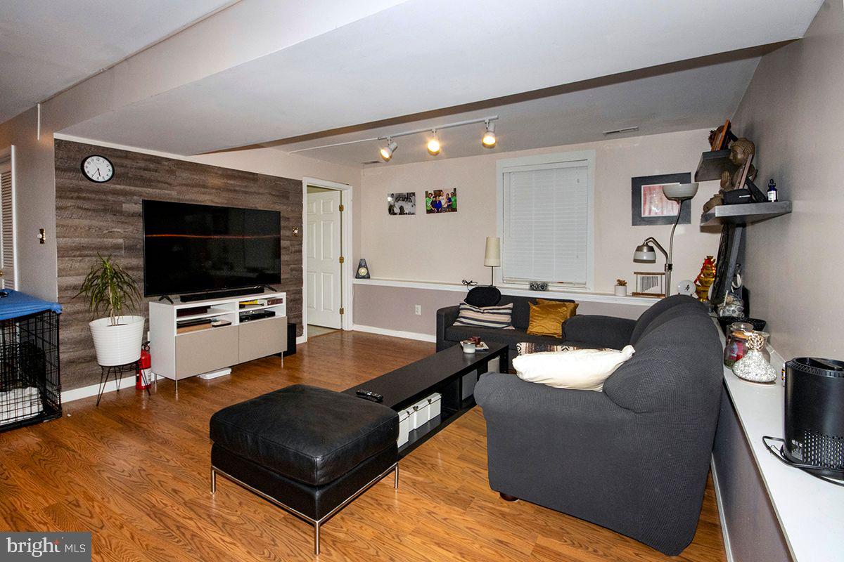 60 Vance Avenue Sicklerville, NJ 08081 - Photo 29 of 42 Lower Level Den : Wood Laminate Flooring