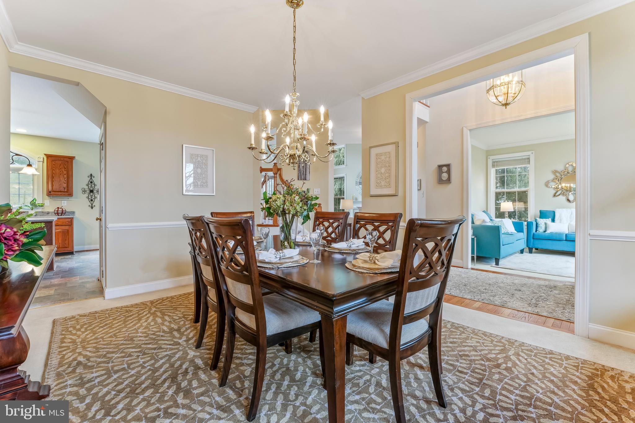 730 Garden Drive Kennett Square, PA 19348 - Photo 12 of 39 a view of a dining room with furniture and wooden floor