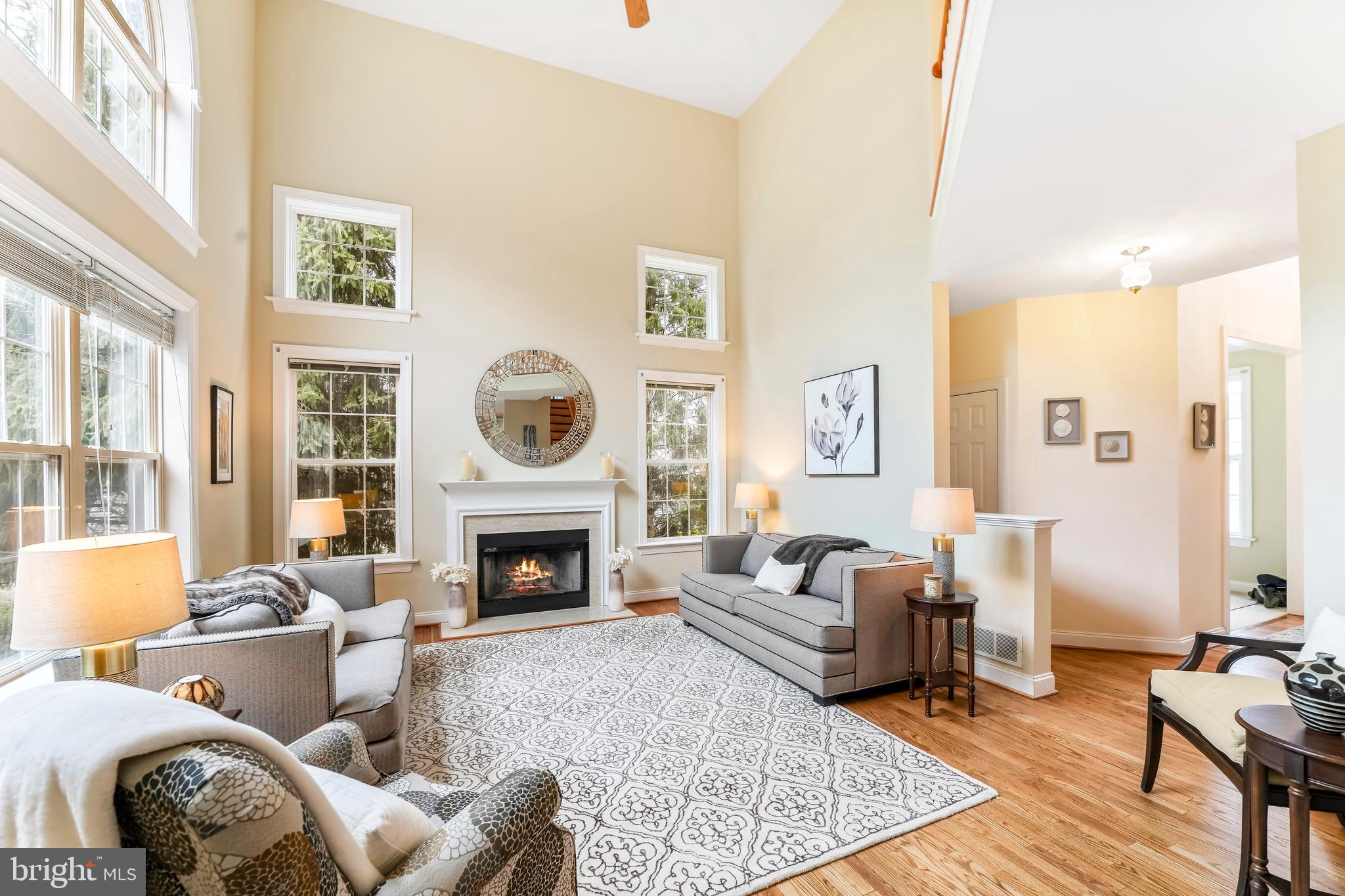 730 Garden Drive Kennett Square, PA 19348 - Photo 17 of 39 a living room with furniture fireplace a rug and a large window