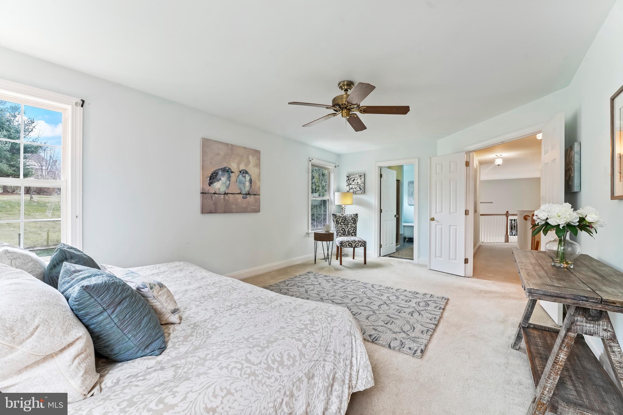730 Garden Drive Kennett Square, PA 19348 - Photo 27 of 39 a bedroom with a bed a chandelier and a dresser
