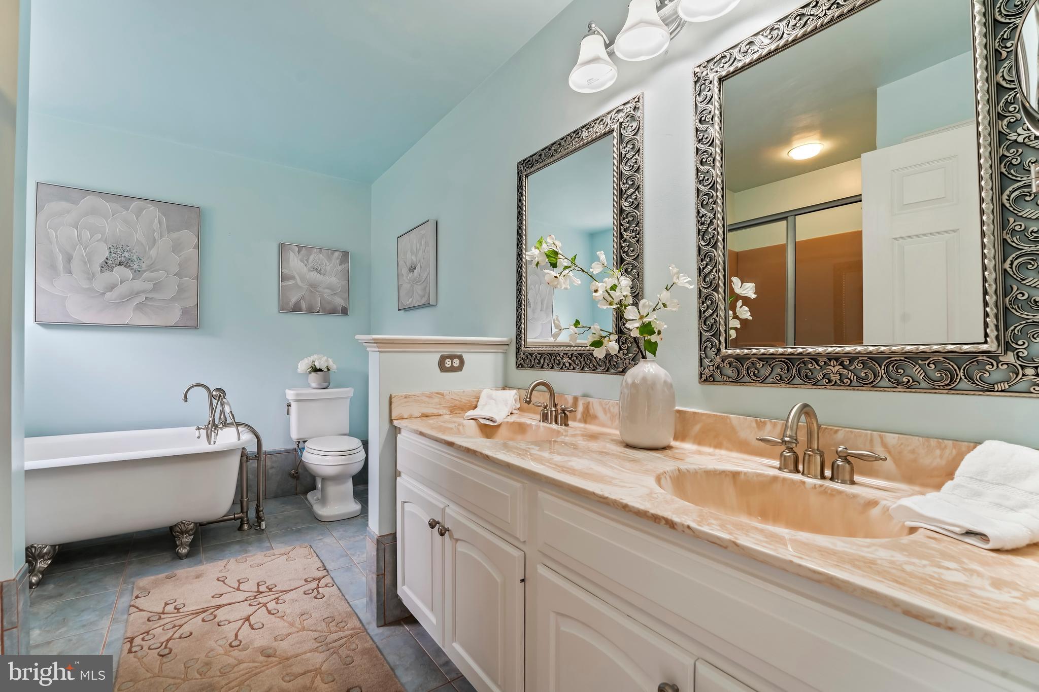 730 Garden Drive Kennett Square, PA 19348 - Photo 28 of 39 a spacious bathroom with a double vanity sink mirror and bathtub