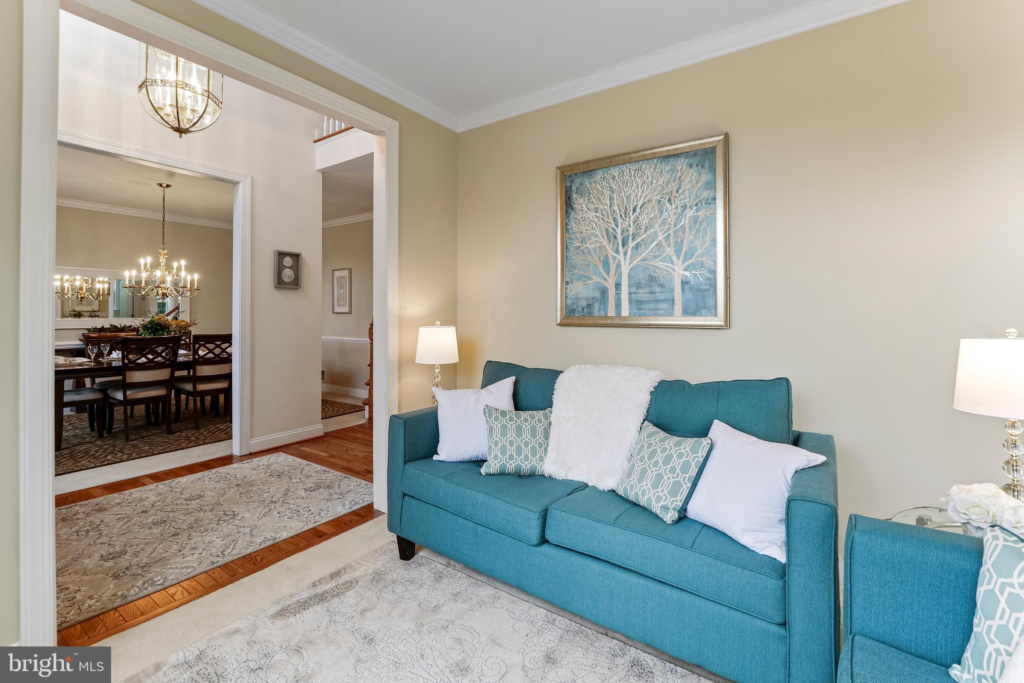 730 Garden Drive Kennett Square, PA 19348 - Photo 8 of 39 a living room with furniture and a flat screen tv
