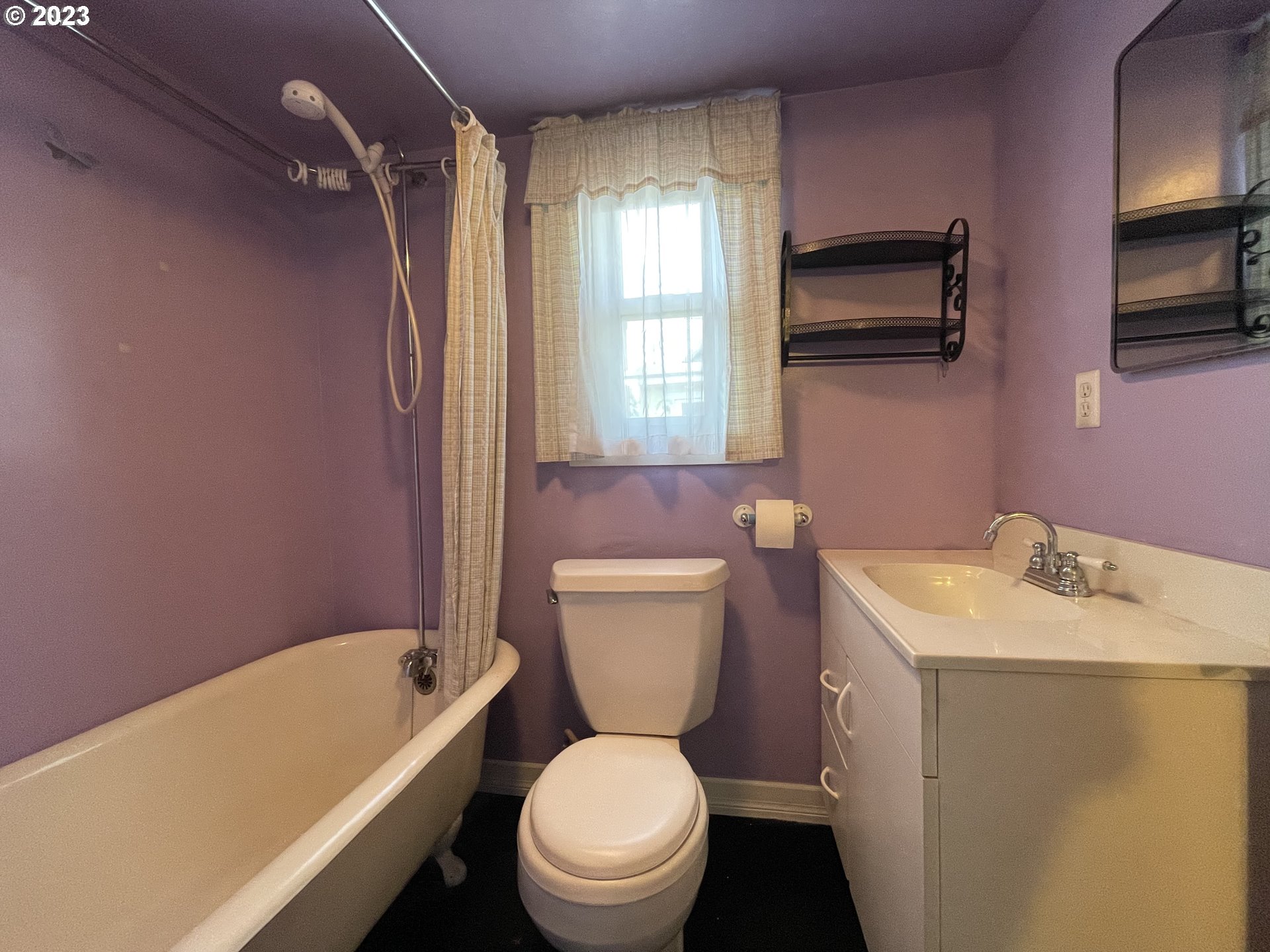 430 E Street Springfield, OR 97477 - Photo 16 of 29 a bathroom with a sink a toilet and a bathtub