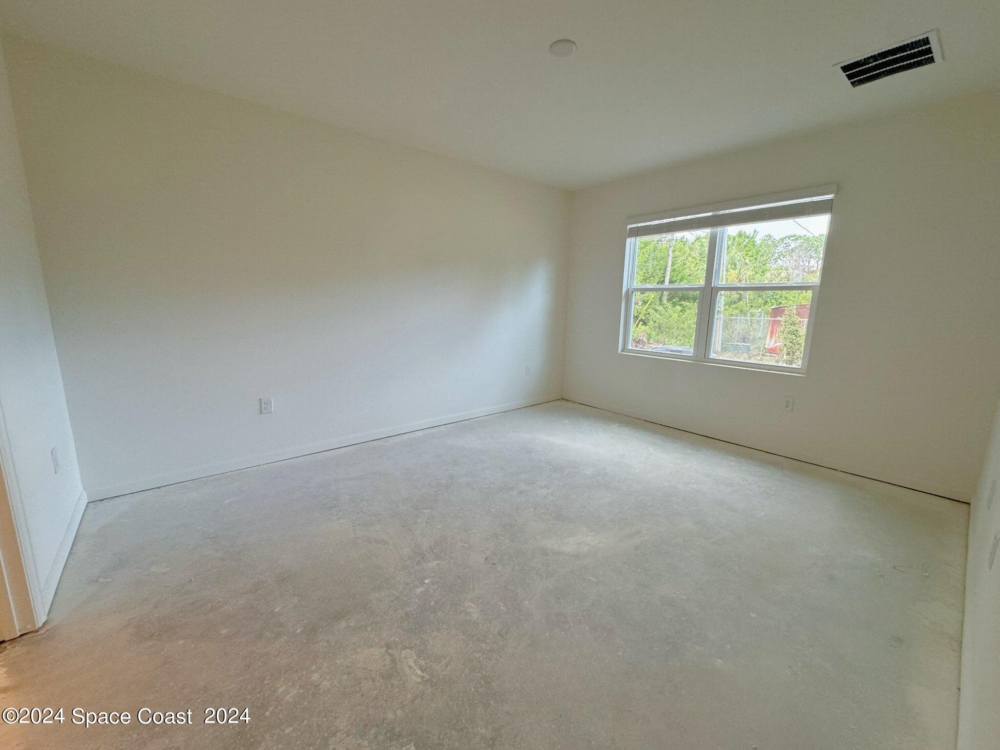 435 Oakleaf Street Southwest Palm Bay, FL 32908 - Photo 13 of 44 13. 435 Oakleaf - Owners Bedroom