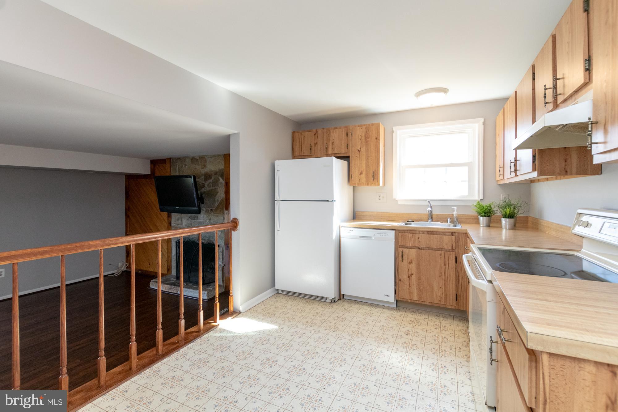 9221 Bowline Road Baltimore, MD 21236 - Photo 14 of 48 Spacious kitchen with natural sunlight