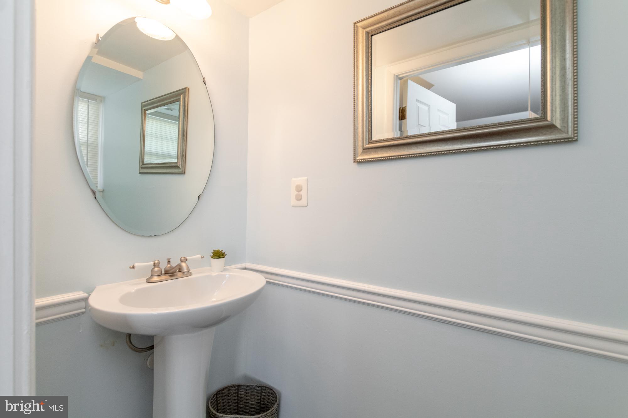 9221 Bowline Road Baltimore, MD 21236 - Photo 22 of 48 Half bathroom conveniently located off family room