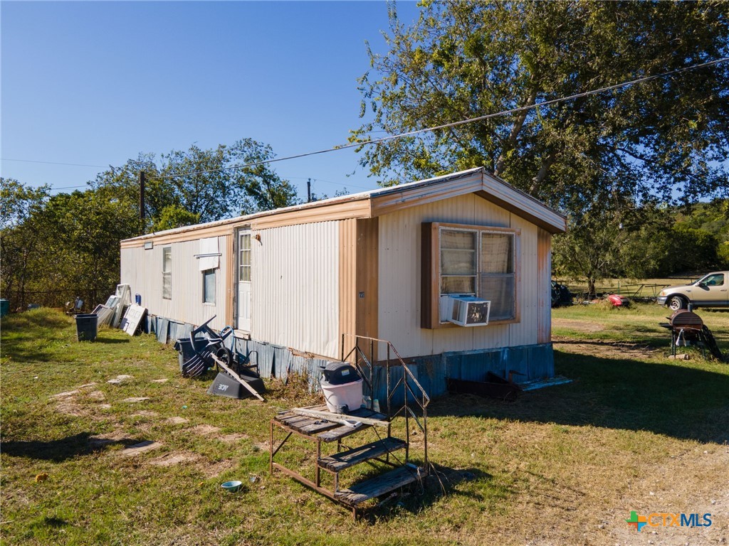 4592 County Road 3220 Kempner, TX 76539 - Photo 6 of 12 a view of a house with backyard
