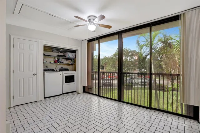 a view of a room with a large window
