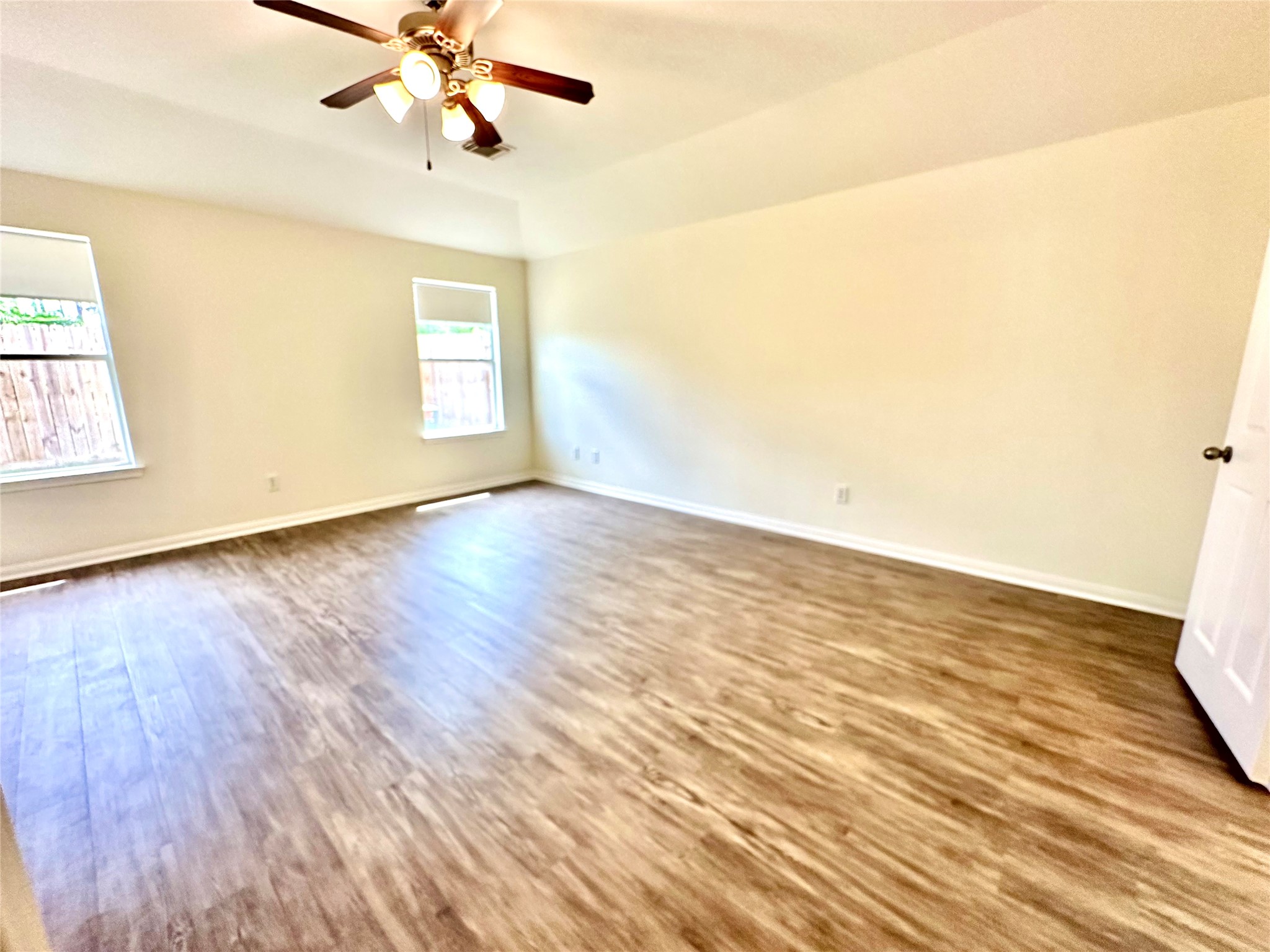 25311 Clover Ranch Drive Katy, TX 77494 - Photo 11 of 27 Primary bedroom with wood looking floors