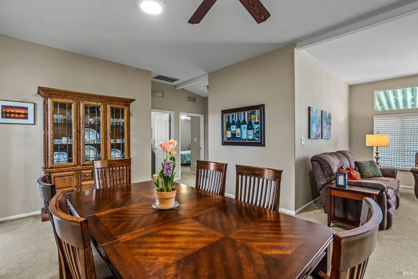 a view of a dining room with furniture