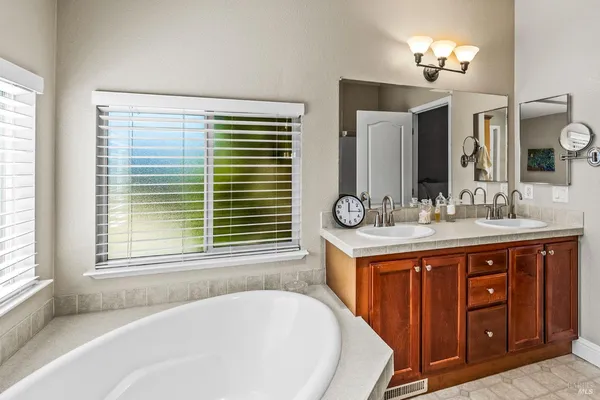 a bathroom with a sink and a bathtub