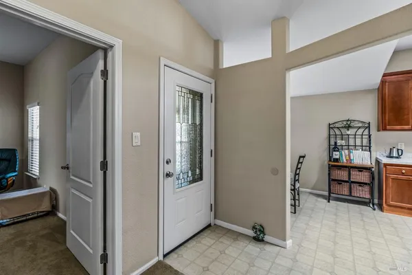 a view of an empty room and window
