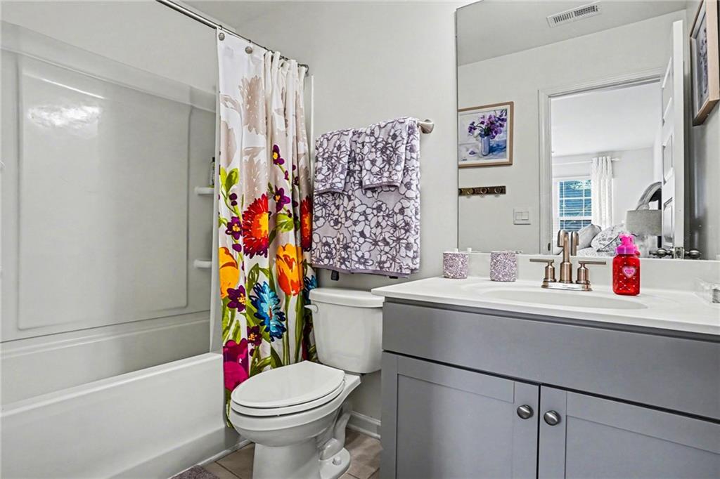 110 Canal Street Hampton, GA 30228 - Photo 36 of 41 a bathroom with a sink toilet and shower