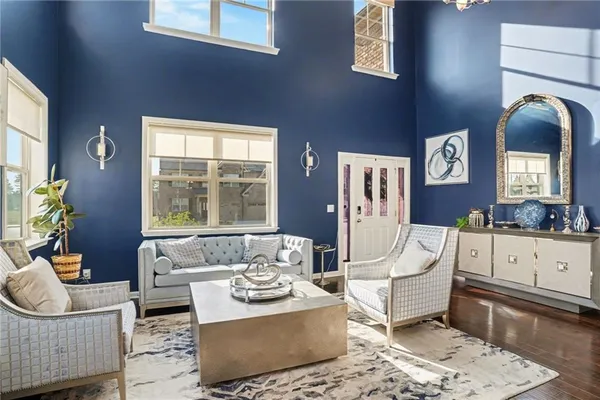 a living room with furniture and window