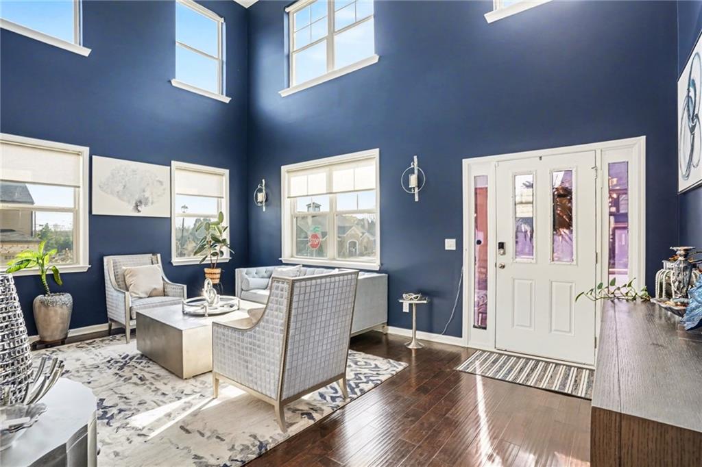 110 Canal Street Hampton, GA 30228 - Photo 6 of 41 a living room with furniture and wooden floor