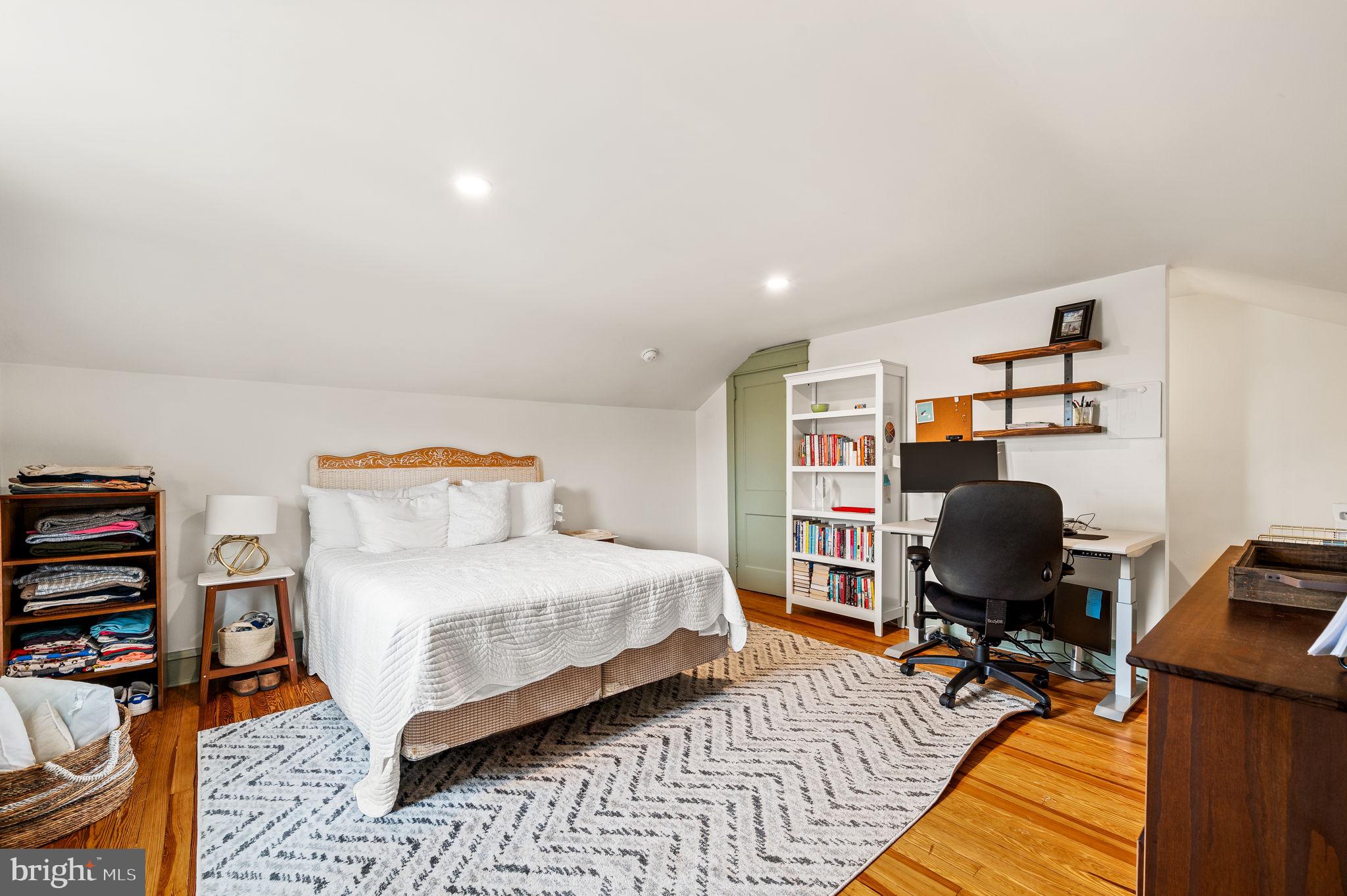 168 Upland Road Havertown, PA 19083 - Photo 23 of 32 a bedroom with a workspace and a couch