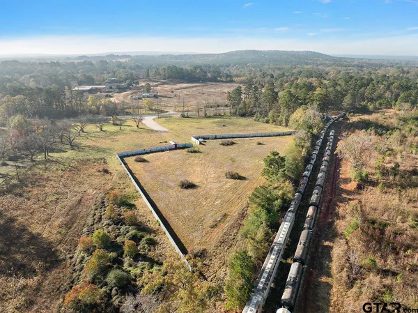 an aerial view of residential building with parking space