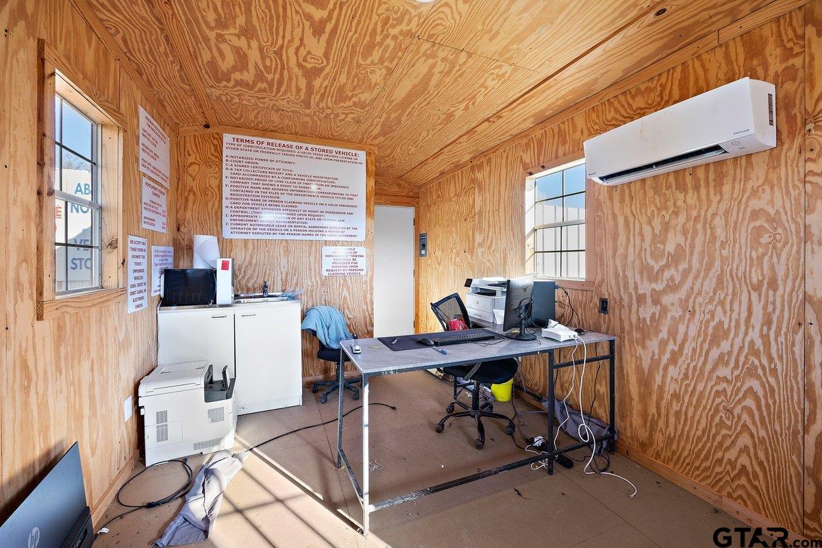 300 Industrial Drive Rusk, TX 75785 - Photo 10 of 11 a workspace with furniture and a window