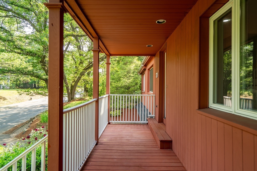 38 Maple Street Lexington, MA 02420 - Photo 3 of 40 a view of a porch with wooden floor and outdoor space