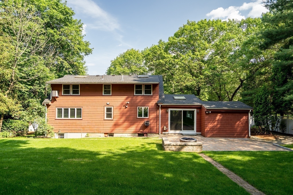 38 Maple Street Lexington, MA 02420 - Photo 35 of 40 a front view of house with yard and green space