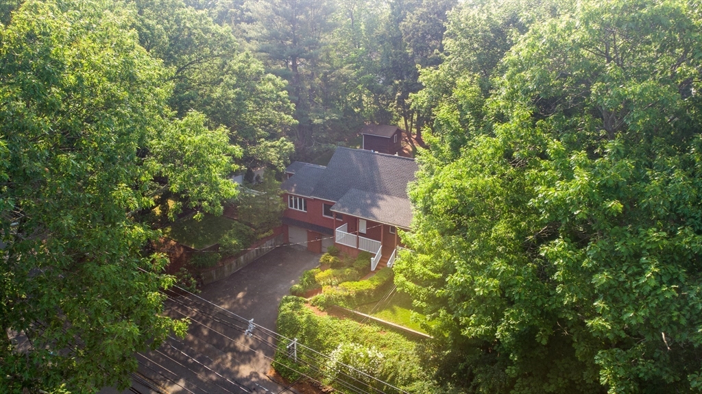 38 Maple Street Lexington, MA 02420 - Photo 39 of 40 a aerial view of a house with a yard