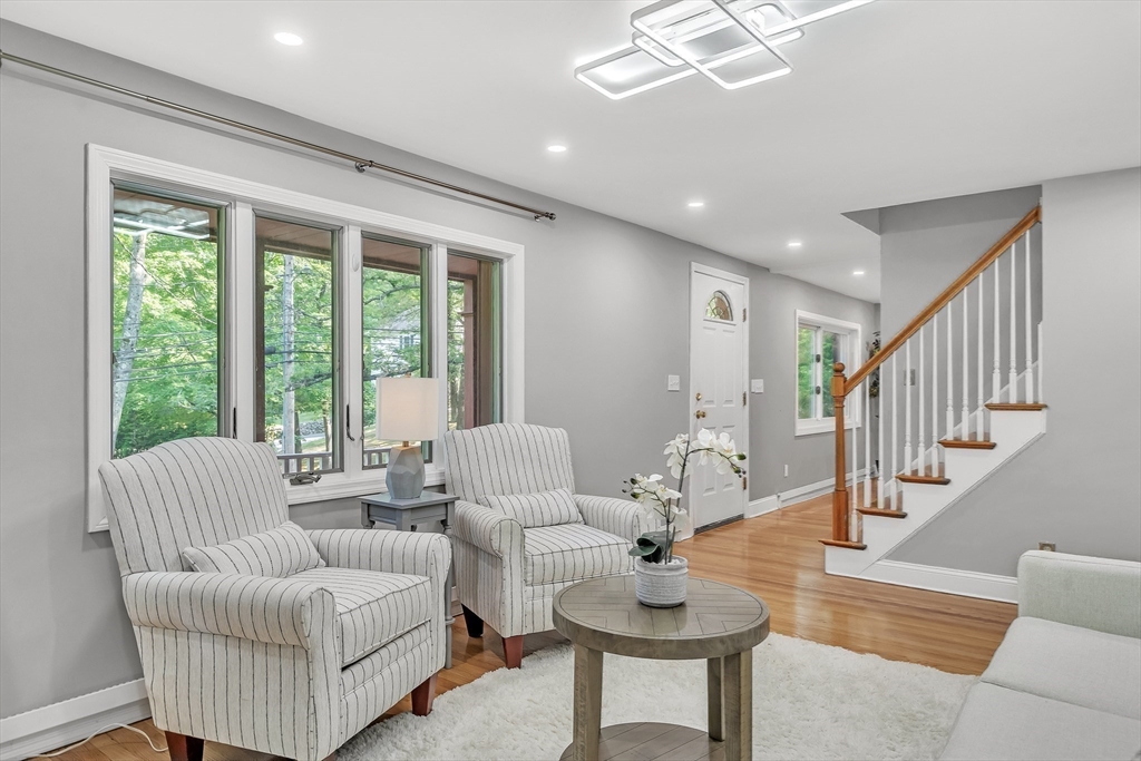 38 Maple Street Lexington, MA 02420 - Photo 7 of 40 a living room with furniture and a large window