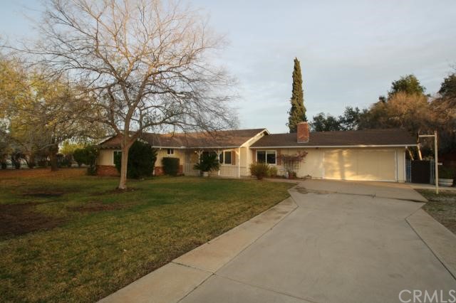 18280 Hibiscus Avenue Riverside, CA 92508 - Photo 1 of 1 Charming single story in Woodcrest with mature tress and lots of space!