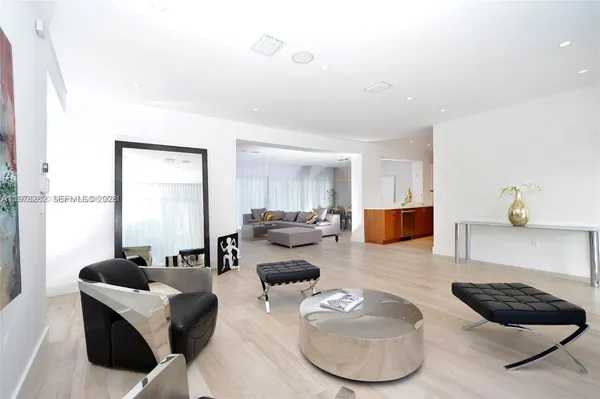 a living room with furniture and a couch