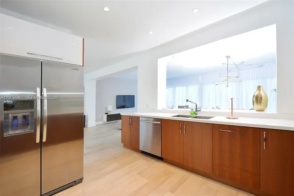 a large bathroom with a double vanity sink and a mirror