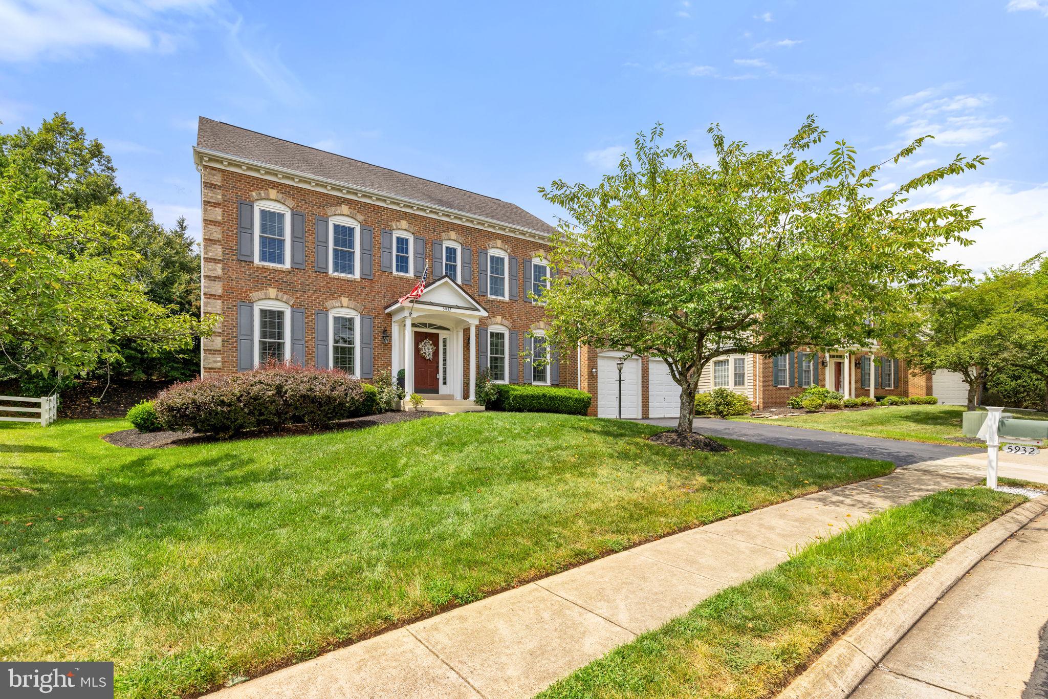 5932 Amber Ridge Road Haymarket, VA 20169 - Photo 1 of 1 a front view of a house with a yard