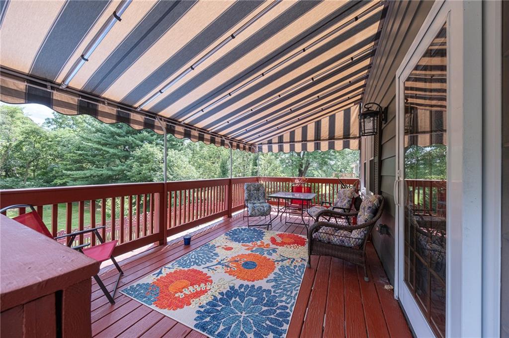 1072 Renton Road Pittsburgh, PA 15239 - Photo 12 of 42 a view of a patio with wooden floor