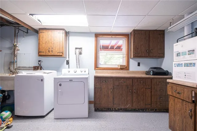 a view of a chairs on the roof deck