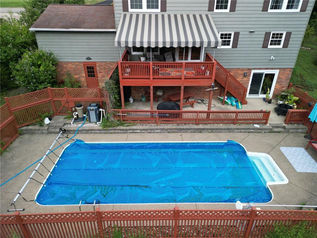 1072 Renton Road Pittsburgh, PA 15239 - Photo 36 of 42 a view of a house with pool and chairs