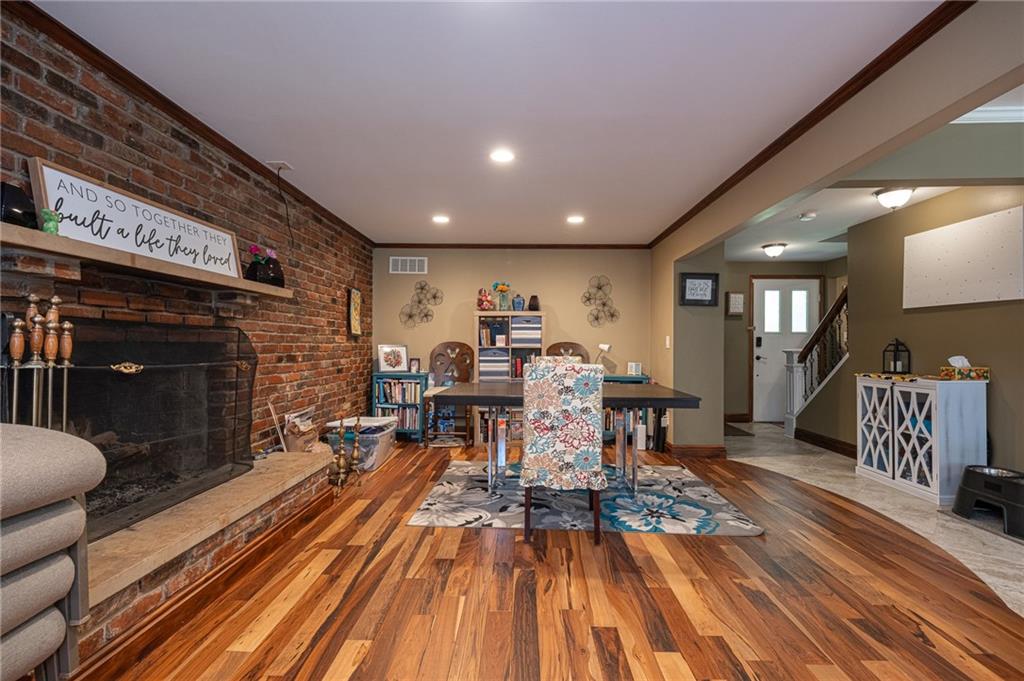1072 Renton Road Pittsburgh, PA 15239 - Photo 4 of 42 a view of a dining room with furniture window and wooden floor